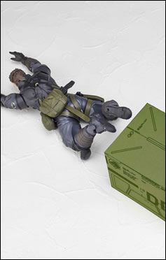 La figurine Vulcanlog de Venom Snake en Sneaking Suit illustre et date