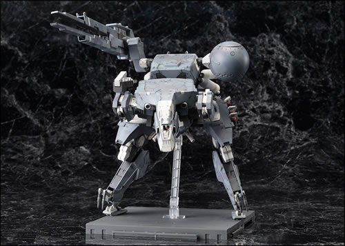 Le Metal Gear Sahelanthropus de Kotobukiya dat avec un poster de Yoji Shinkawa